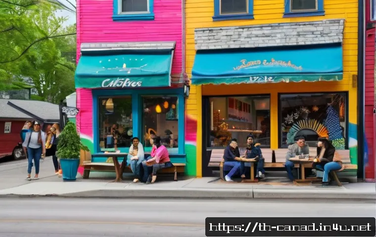 토론토 여행 꿀팁 - A vibrant street scene in Toronto&rsquo;s Quebec Village during the day, featuring colorful graffiti walls...